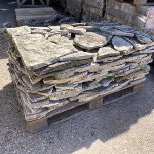 Full pallet of blue limestone showing size and weathering.