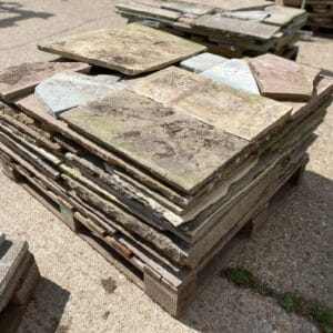 A pallet of broken and old stock Indian sandstone and limestone.