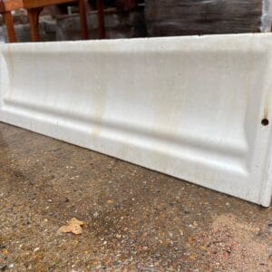 An enamelled cast iron bath panel.