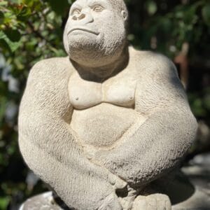 Front view of the silverback gorilla statuette showing its full pose.